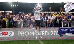 Derby's Conor Hourihane lifts the League One runners-up trophy.