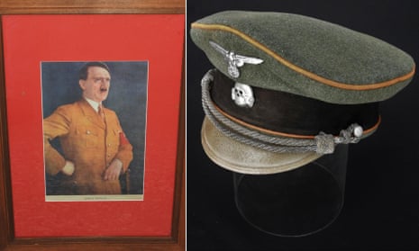 A composite image of a framed colour picture of Adolf Hitler and a Nazi SS officers visor cap being sold on an auction site in Australia