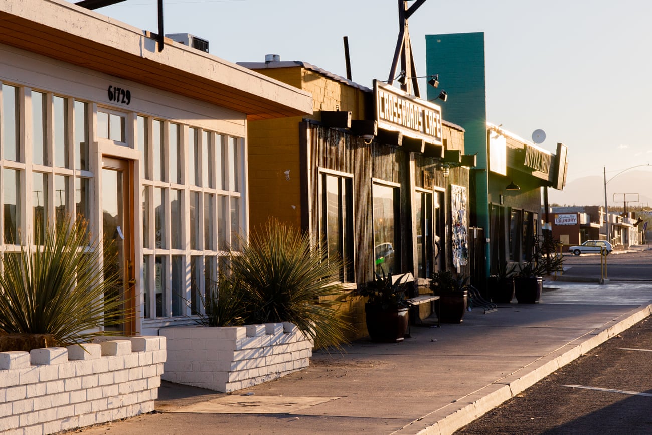 sidewalk alongside single story buildings