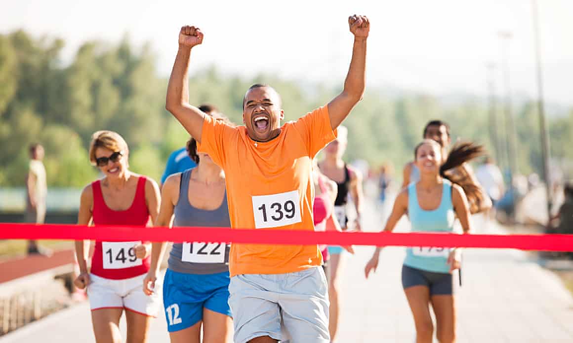 Runners finishing a race.