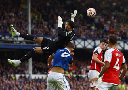 17 September 2023 Arsenal’s David Raya tumbles over Everton’s James Tarkowski at Goodison Park.