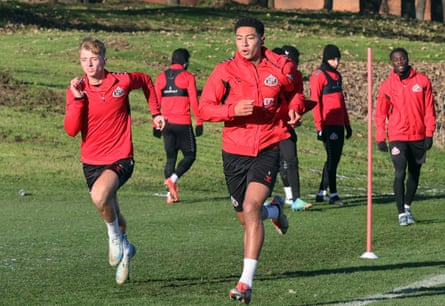 Jobe Bellingham and Tommy Watson warm up during a Sunderland training session in November 2024