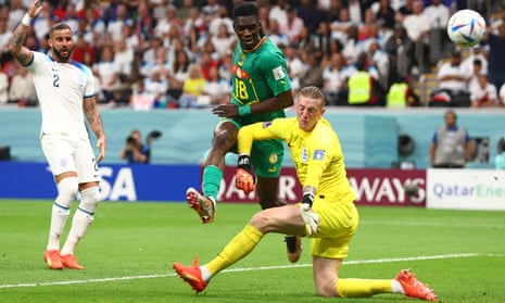 Ismaïla Sarr is denied by Jordan Pickford at close range during England’s victory over Senegal