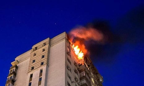 An apartment building burns after being damaged during a massive Russian drone strike, amid Russia's attack on Ukraine, in Kyiv, Ukraine 30 May 2023. 