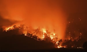 Smoke billows into the sky as the Glass Fire burns in the hills of Calistoga, California.