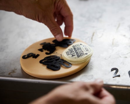 A person making cheese.