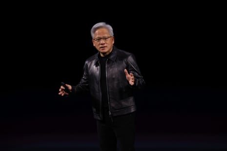 An older man in a leather jacket speaks