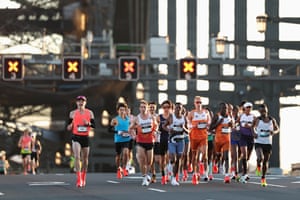Runners cross the the Sydney Harbour Bridge