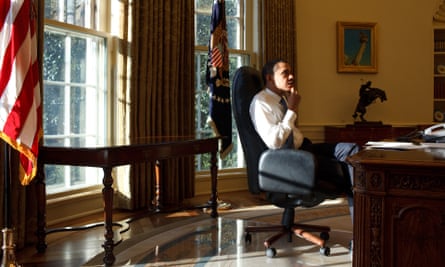 President Barack Obama in the Oval Office on his first day in office