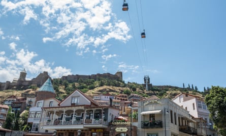 View of Tbilisi’s old town with Narikala Fortress, St Nicholas church and cable cars visible
