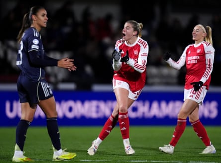 Russo (centre) urges on the home crowd after scoring the equaliser