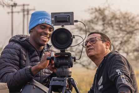 Noel Kok (right) and Nkosi assessing camera equipment