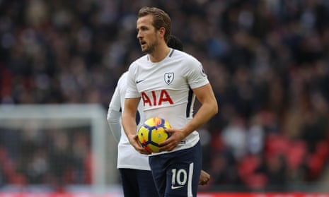 Harry Kane leaves the field with the match ball after scoring his eighth hat-trick of the year against Southampton.
