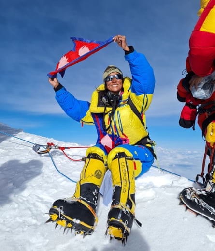 Purnima Shrestha on top of Mount Kanchenjunga in the Nepalese Himalayas