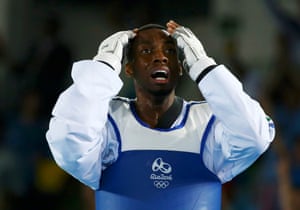 Taekwondo - Men’s -80kg Gold Medal Finals2016 Rio Olympics - Taekwondo - Men’s -80kg Gold Medal Finals - Carioca Arena 3 - Rio de Janeiro, Brazil - 19/08/2016. Lutalo Muhammad (GBR) of United Kingdom reacts after his defeat to Cheikh Sallah Cisse (CIV) of Ivory Coast. REUTERS/Peter Cziborra (BRAZIL - Tags: SPORT OLYMPICS SPORT TAEKWONDO) FOR EDITORIAL USE ONLY. NOT FOR SALE FOR MARKETING OR ADVERTISING CAMPAIGNS.