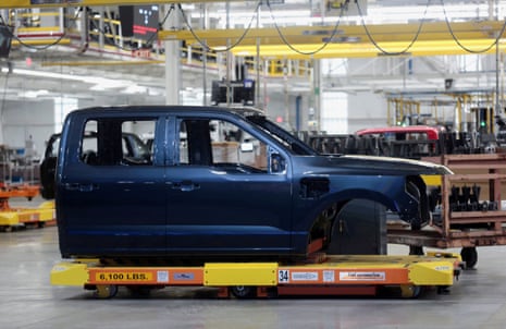 A cab of a model of the F-150 Lightning electric pickup truck on the assembly line