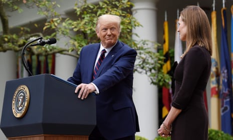 Donald Trump in the Rose Garden of the White House, alongside his supreme court nominee, Amy Coney Barrett.