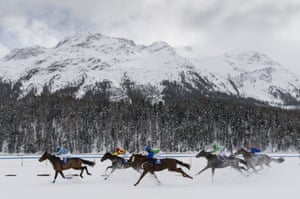 Fabian Xaver Weissmeier on Mateur, second from left, wins the Prize Wroclaw Euroean Capital of Culture 2016 on the frozen Lake St. Moritz on the second weekend of the White Turf races in St. Moritz, Switzerland.