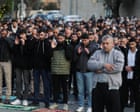 Palestinians pray in street after Israeli authorities close al-Aqsa mosque – video