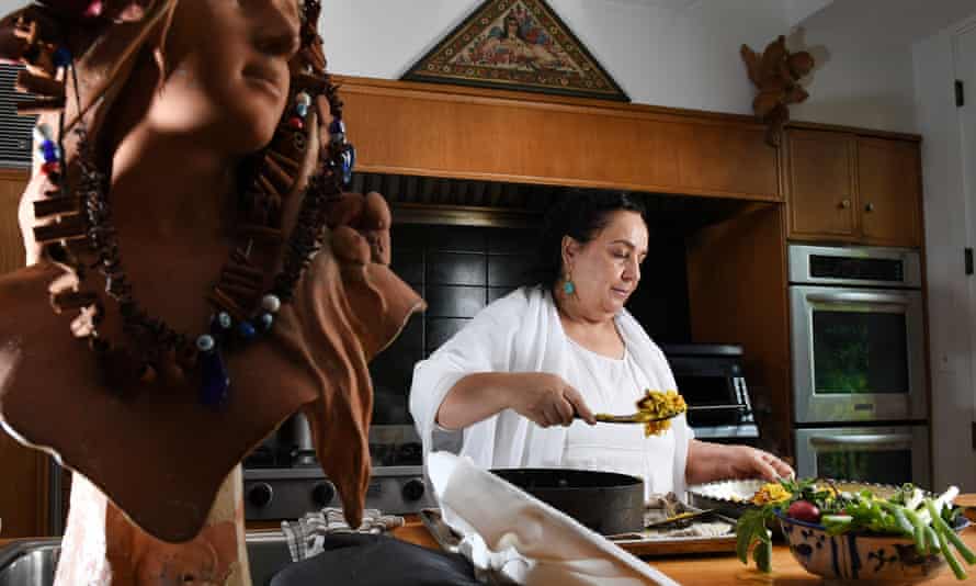 Najmieh Batmanglij cooks at her home on 25 October 2018 in Washington DC.