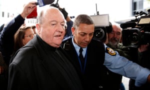 Archbishop of Adelaide Philip Wilson leaves after sentencing at Newcastle local court on Tuesday.