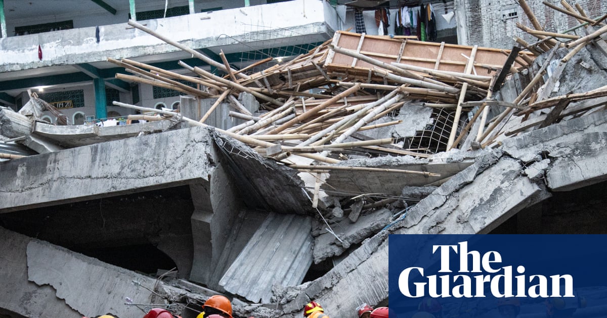 Indonesia school collapse: 91 missing and three dead as rescuers search rubble for second day