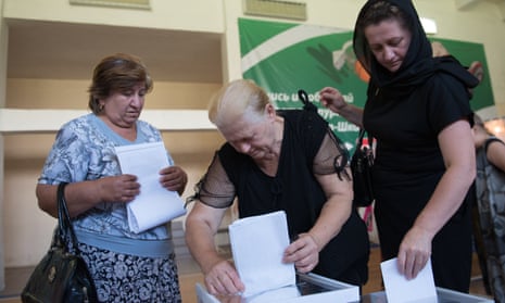 Russian citizens vote at a polling station in Russia’s 2016 parliamentary election.