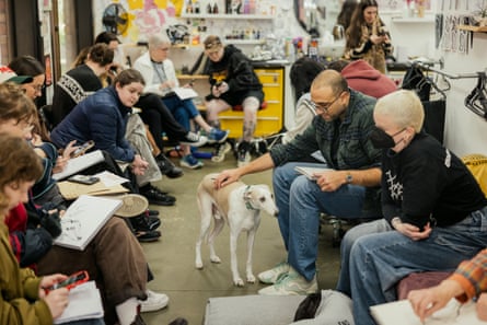 Fettuccine does the rounds during the class, investigating participants’ bags for any undeclared treats.