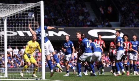 Brentford’s Kevin Schade watches Dara O’Shea leap in vain as the ball goes into the Ipswich net