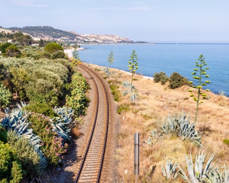 Single track railway by Mediterranean sea