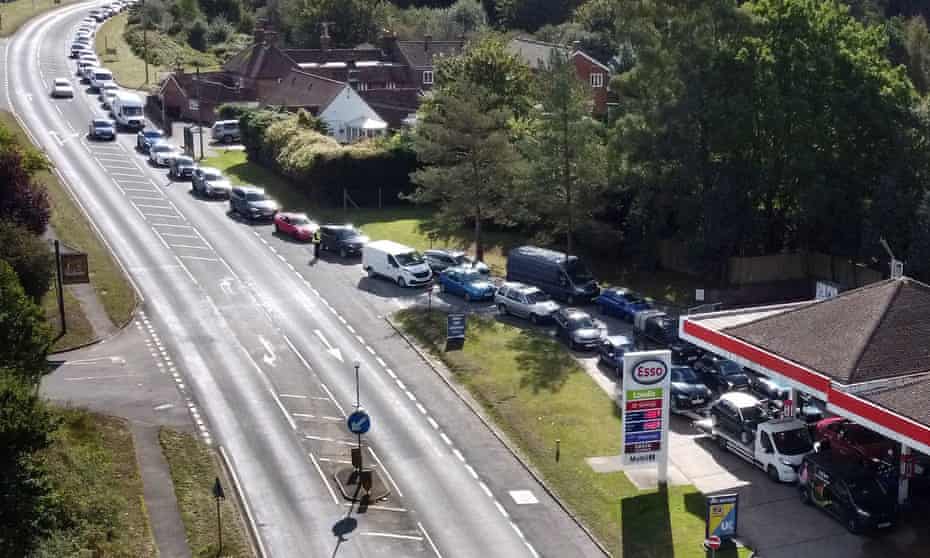 Motorists queue for fuel at a petrol station in Ashford, Kent, on Wednesday.
