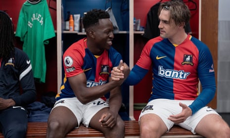 Toheeb Jimoh and Phil Dunster, in football kit in the dressing room, in Ted Lasso