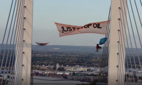 A screengrab from video footage of the Just Stop Oil protest on the Queen Elizabeth II bridge.