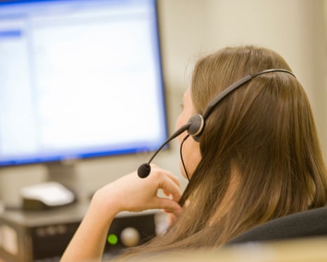 A woman in a call centre using a phone headset