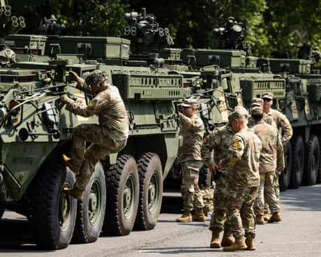 Millions expected at ‘No Kings’ protests before Trump’s military parade – live updates