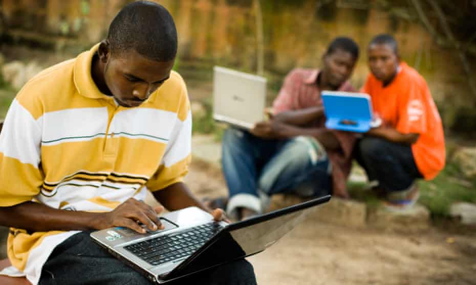 Students use laptops at the Kokrobitey Institute in Ghana