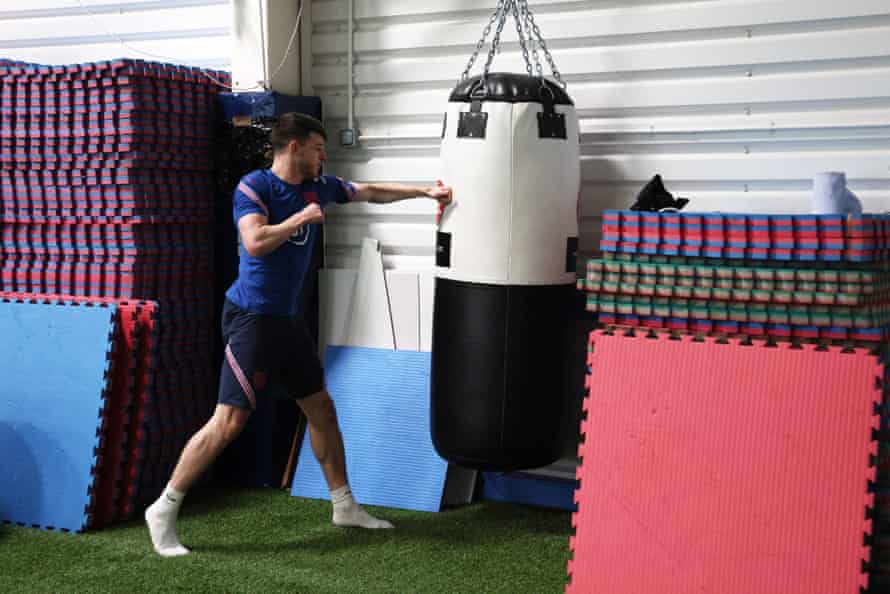 Declan Rice gets warmed up for a training session at Pennyhill Park