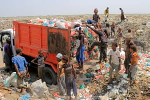 Hodeida, YemenYouths collect recyclable items at a rubbish dump in Yemen’s Red Sea port city