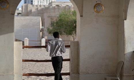 A security guard outside Souq Waqif, a marketplace in Doha, Qatar. 