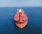 Oil jumps after Iran attempts ‘surprise attack’; chip stocks slump further as AI sell-off continues – business live