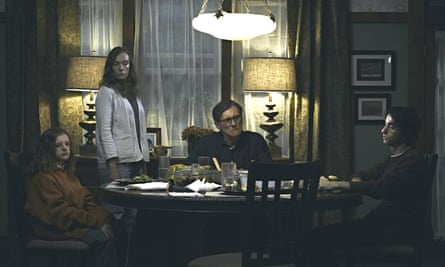 Toni Collette with Milly Shapiro, Gabriel Byrne and Alex Wolff in Hereditary.