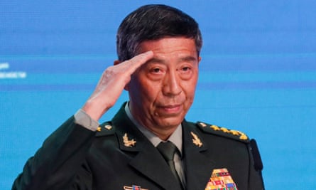 Former Chinese defence minister Li Shangfu saluting