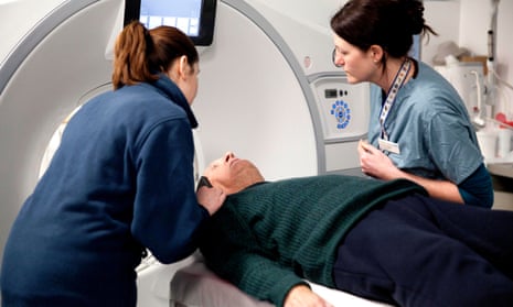 Senior radiographers conduct an MRI scan at St Georges Hospital in Tooting.