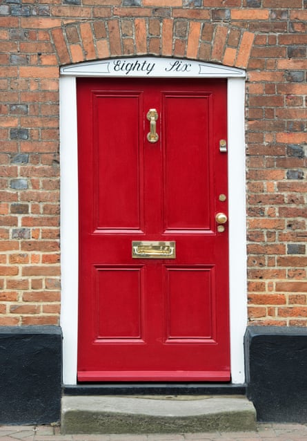 Red front door on cottage