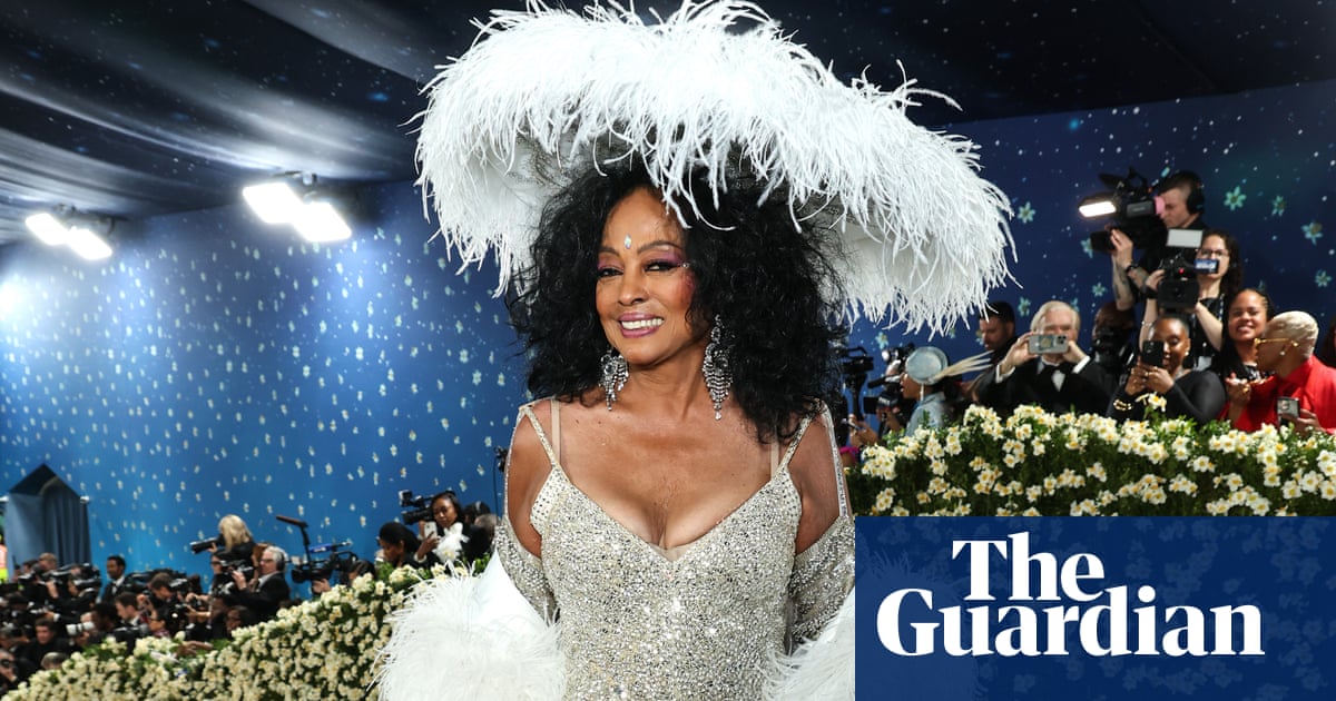 Met Gala 2025 red carpet: pinstripes, capes and pouring rain in pictures