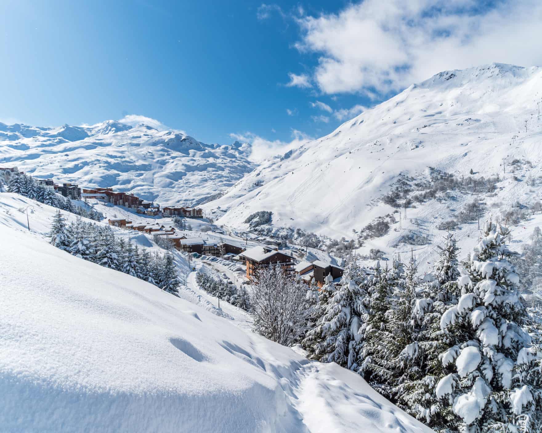 Les Menuires town seen from pristine snowy pistes above