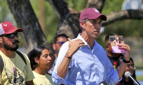 Beto O'Rourke on Friday with family members of the children who lost their lives at Robb elementary school.