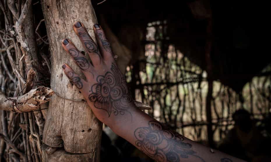The henna decorated hand of a Somali girl