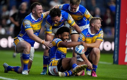 Leeds' Kallum Watkins celebrates scoring a try against Leigh