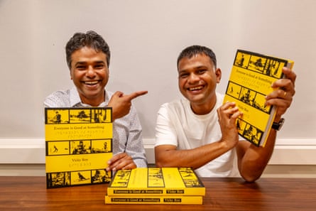 Vicky Roy, right, sitting next to VR Ferose, with copies of the book, Everyone is Good at Something